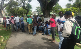 The workers on the avenue of Main Street yesterday in front of the GPL Office. 