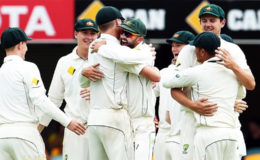 The Australia team is relieved after finally knocking over the dogged Pakistan team in the first test.
