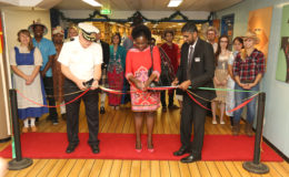 Captain Randy Grebe (left), Minister within the Ministry of Education Nicolette Henry (middle) and Director of the ship Seelan Govender, cutting the ribbon yesterday at the opening ceremony of the Logos Hope.
