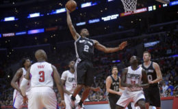 Los Angeles, CA, USA; San Antonio Spurs forward Kawhi Leonard (2) moves in to dunk against the Los Angeles Clippers during the second half at Staples Center on Thursday. Mandatory Credit: Gary A. Vasquez-USA TODAY Sports