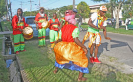 Masqueraders in Camp Street (Stabroek News file photo)