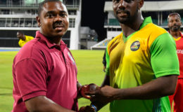 BCA official Kamal Springer presents Raymon Reifer with the Player-of-the-Match award during the third round match between Combined Campuses & Colleges Marooners and Guyana Jaguars in Group “B” of the Regional Super50 Tournament on Saturday at the Kensington Oval. Photo by WICB Media/Randy Brooks of Brooks Latouche Photography

