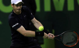 Andy Murray  in action vs  Nicolas Almagro in  Doha, Qatar (REUTERS/Ibraheem Al Omari)

