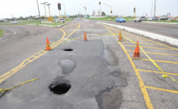 Twin holes on road: Two holes have opened up on the Kitty Public Road forcing the authorities to close off a part of the busy thoroughfare. Parts of this road have been showing signs of undermining for a number of months and patch jobs were done only for the problem to recur. In recent days the problem has become more serious and appears to be linked to the sinkhole that has opened up not  far away at the seawall.
