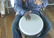 Orlando Primo on his drum at the opening of his drumming school in 2010.
