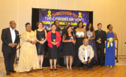 Some of the awardees with founder of the Caribbean Voice Anand Boodram (stooping in front).

