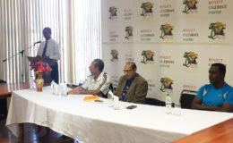 President of the AAG, Aubrey Hutson (left) makes a point at the opening ceremony of the IAAF level-1 track and field course yesterday at the National Resource Centre. Looking on (left to right) are course lecturer Oscar Gadea, GOA President K. Juman-Yassin, and course lecturer Raymond Gilson.(Photo/Emmerson Campbell)