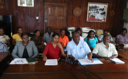 President of the Guyana Public Service Union, Patrick Yarde (third from left) tells reporters that the persistent ill-treatment of sweeper/cleaners is the government’s “badge of shame.” 