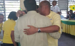 New leader Raphael Trotman (at right) and his predecessor Khemraj Ramjattan embrace after the vote. (Photo taken from Moses Nagamootoo’s Facebook page)