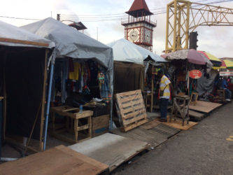 Some of the vendors who previously occupied spots in the ‘Parliament View’ vending area have relocated to this vacant space opposite the Timehri bus park. 