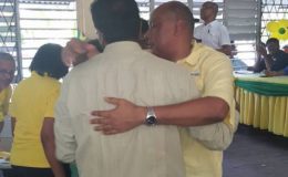 New leader Raphael Trotman (at right)  and his predecessor Khemraj Ramjattan embrace after the vote. (Photo taken from Moses Nagamootoo's Facebook page)