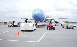 An aircraft on the ground at the Cheddi Jagan International Airport (Stabroek News file photo)