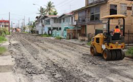 Quamina Street, Georgetown, between Camp and Waterloo streets finally got the attention of the authorities and road works commenced on eliminating the deep potholes yesterday. (Photo by Keno George)

