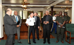 President David Granger (second from right) speaking with Lieutenant General Joseph DiSalvo. Also in photo at right is new Chief of Staff of the Guyana Defence Force, Brigadier Patrick West. At left is US Ambassador to Guyana, Perry Holloway and second from left is Minister of Natural Resources, Raphael Trotman. (Ministry of the Presidency photo)