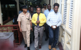 Mark Royden Williams  (second from right) was sentenced to death after a gruelling weeks-long trial while his co-accused Roger Simon (right) was acquitted. Not in photo is Dennis Williams who was also sentenced to death. (Keno George photo)