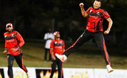 Seamer Rayad Emrit celebrates one of his three wickets as he helped push Red Force towards victory. (Photo courtesy WICB Media) 