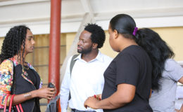 The complainant, Petronella (second from right) in conversation with SASOD Director Joel Simpson and other supporters.
