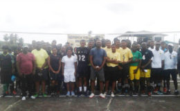 The participants pose for a photo opportunity following the conclusion of the one day volleyball tournament. Organiser and former national volleyball player Levi Nedd is at right.
