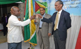 From left, Guyana’s Second Vice-President and Minister of Foreign Affairs Carl Greenidge, Guyana High Commissioner Biswaishwar ‘Cammie’ Ramsaroop-Maraj and Trinidad and Tobago Foreign Affairs Minister Dennis Moses toast to the opening of Guyana’s new High Commission on Alexandra Street, Port of Spain, on Wednesday. (Trinidad Express/Ishmael Salandy photo)