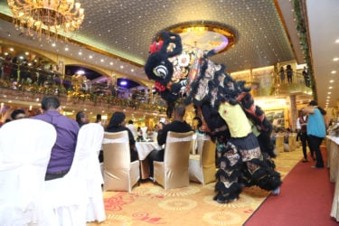 The Chinese Dragon Dancer entertaining guests at the opening of the “new” New Thriving Restaurant at the Amazonia Mall last evening.  (Photo by Keno George)