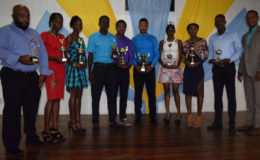 The recipients of the AAG’s award ceremony posing with their spoils on Saturday night at YMCA on Thomas Lands.