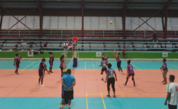 Action during the Lenny Shuffler volleyball competition Sunday night at the National Gymnasium.