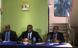 Opposition Leader and leader of Dominica’s United Workers Party Lennox Linton (at centre) yesterday. 