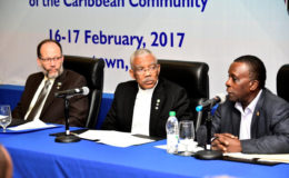 President David Granger (at center) and Caricom Secretary-General Ambassador Irwin LaRocque pay rapt attention as Prime Minister of Grenada Dr. Keith Mitchell makes a point during the press conference. (Ministry of the Presidency photo)
