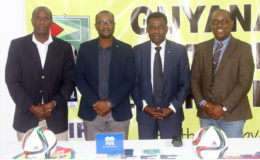 Veron Mosengo-Omba (second from right), FIFA Director of Member Associations and Development for Africa and the Caribbean, and members of the GFF executive committee including President Wayne Forde (second from left), first vice-president Bruce Lovell (left) and Rawlston Adams at the conclusion of the press conference.
