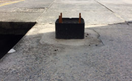 Another base that is unused on Robb Street cemented to the pavement.
