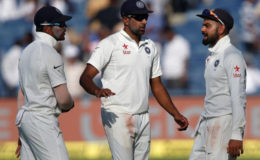 India’s Virat Kohli, Ravichandran Ashwin and Umesh Yadav will be hoping that the first test defeat acts as a wake-up call for the entire team. (Reuters photo)
