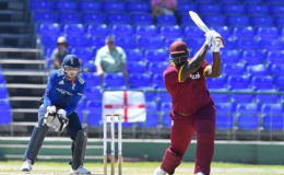 All-rounder Rahkeem Cornwall drives sweetly through the off-side during his 59 against England in the 50-overs tour match at Warner Park. (Photo courtesy WICB Media)