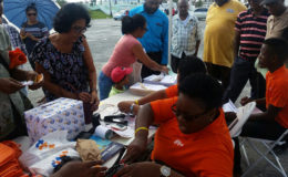 Essequibo Coast residents signing up for the service
