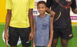 CHAMPIONS ALL! From left, Nicholus Romain, Danesh Persaud and Nigel Bryan winners of the Forbes Burnham Memorial B Class, C Class and handicap tournaments last weekend at the National Gymnasium.
