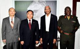 From left are Deputy Chief of Mission, Yang Chenqi, China’s Ambassador to Guyana, Cui Jianchun, President David Granger and Chief of Staff of the Guyana Defence Force, Patrick West (Ministry of the Presidency photo) 