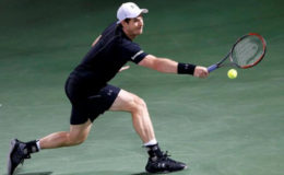 Andy Murray of Britain in action in Dubai (REUTERS/Ahmed Jadallah)