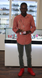 Samuel Medas poses with his Marlin award.