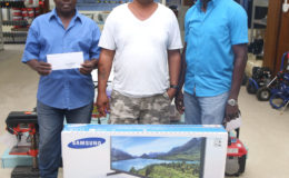 (From left) The winners of Toolsie Persaud’s Grand Mashramani Promotion Leroy Lewis (first place), Sean Clarke (second place) and Hubert Urlin (third place).