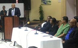 Minister of Natural Resources Raphael Trotman (at podium) making his presentation, Minister within the Ministry of Natural Resources Simona Broomes is seated at extreme left) 