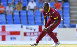 West Indies captain Jason Holder puts down a sharp chance of Jason Roy during the England innings of the first ODI on Friday. (Photo courtesy WICB Media) 