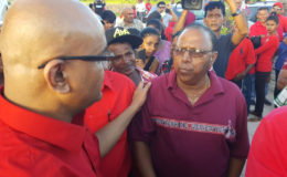 Opposition Leader Bharrat Jagdeo (left) greeting Dr. Verasammy Ramayya at Babu John yesterday at the conclusion of memorial observance for the late President Cheddi Jagan.