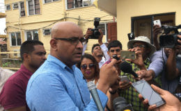 Former president Bharrat Jagdeo speaks with reporters after he was questioned by SOCU investigators 