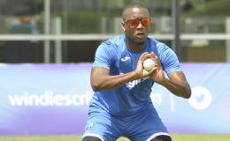 Fast bowler Miguel Cummins goes through a catching drill during a West Indies training session at Kensington Oval yesterday. (Photo courtesy WICB Media) 