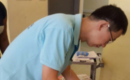 Dr Wan conducting a procedure on a patient