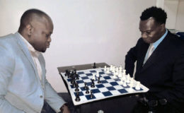 Attorney-at-Law James Bond (left) and the CEO of Silicon Green Frankie Farley are models of concentration as they play a game of chess last Thursday. Bond hopes to become the next president of the Guyana Chess Federation. Bond, Farley and some others, operating at the pinnacle of a management structure, believe that collectively they can influence the nature of, and goodwill for chess in Guyana. Bond is an avid chess player, who has supported the game in the past. Chess elections will be held on Sunday, March 26.
