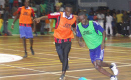 Flashback! Okeene Fraser (left) of eventual champions Bent Street battling Travis Grant of Sparta Boss during the dying moments of last year’s final at the Cliff Anderson Sports Hall.