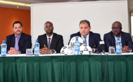 CONCACAF President Victor Montagliani (3rd from right) addressing the gathering while other members at the head table look on.
From left, GFF PRO Debra Francis, Aruba Football Association President Richard Dijkhoff, GFF President Wayne Forde, St. Maarten Football Association boss Fabrice Baly and CONCACAF Legal Advisor Marco Leal. (Orlando Charles photo)