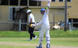 Demerara skipper Shoaib Shaw acknowledges the small crowd and teammates after registering his second half century at the Inter-County level.  