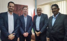 From right are Komal Singh, Minister of Natural Resources Raphael Trotman, Tom Field and  Ilias Avramikos (MNR photo)
