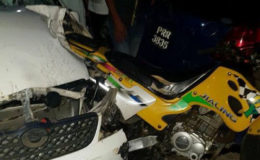The motorcycle can be seen stuck to the front of the car after the accident 